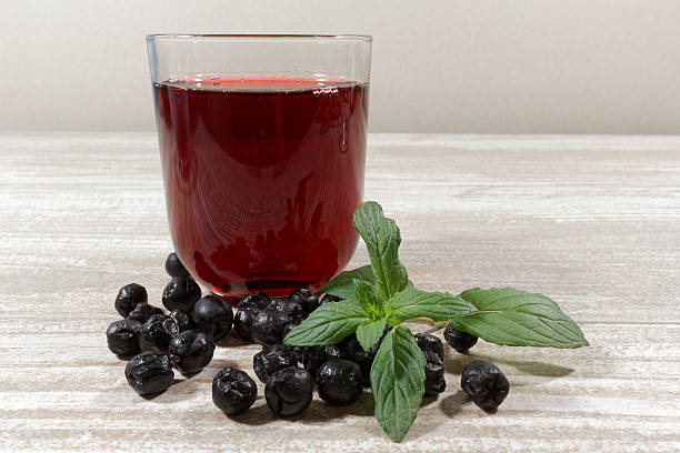 istock Aronia Berry Juice on wooden table 518596820