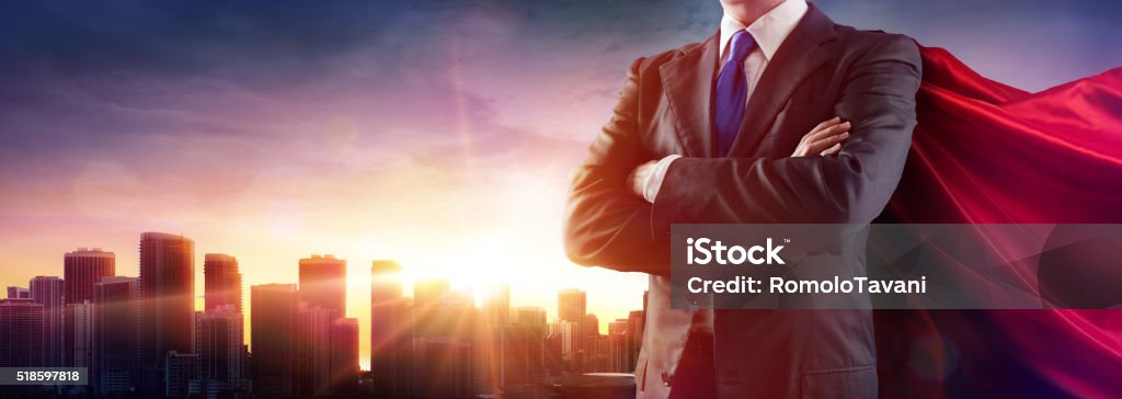 Businessman With Red Cape Businessman Superhero With Red Cape Dominates The City Superhero Stock Photo