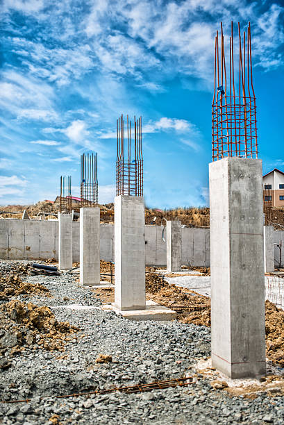Reinforced steel bars on construction pillars, concrete details and beams Reinforced steel bars on construction pillars, concrete details and beams girder stock pictures, royalty-free photos & images