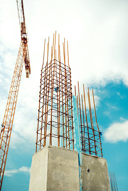 istock concrete pillars with reinforced steel on construction site 518598194