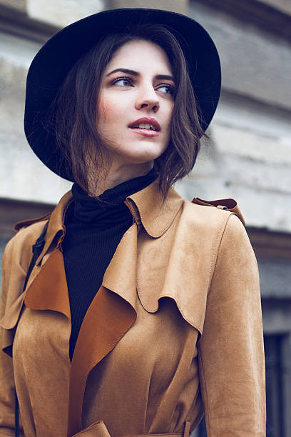 istock Beautiful woman in coat 518598418