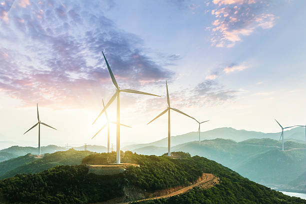 ветряная электростанция - factory green industry landscape стоковые фото и изображения