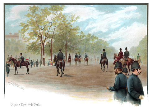 London, England - February 12, 2016: Victorian people walking and riding in Rotten Row, Hyde Park, London, with policemen watching. From “Souvenir of London - 14 fac-Similes (sic) of Water-Colours by Carl J Becker” published by Henri Nestlé, 9 Snow Hill, EC, London, 1891. The book is an advertising publication by the chocolate manufacturers Nestlé and most of the paintings bear some advertising for their products.