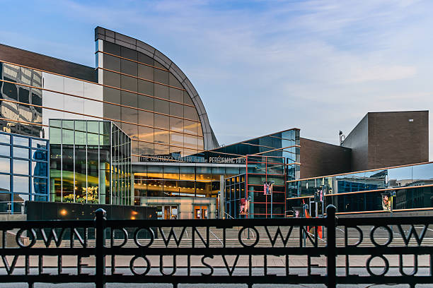 The Kentucky Center for the Performing Arts Louisville, Kentucky, USA - March 27th 2016: Kentucky Center for the Performing Arts building in Louisville Kentucky with rod iron fence which states "Downtown Louisville" in foreground. kentucky derby stock pictures, royalty-free photos & images