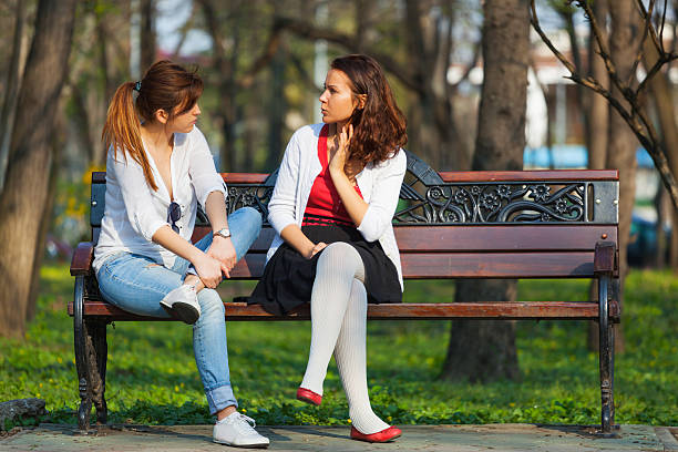 istock Women relaxing in a park 518616788