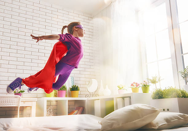 istock girl in Superhero's costume 518617300