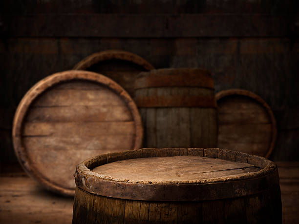 background of barrel background of barrel and worn old table of wood, barrel stock pictures, royalty-free photos & images