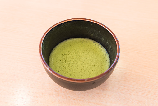 fresh hot  green tea in japanese traditional cup