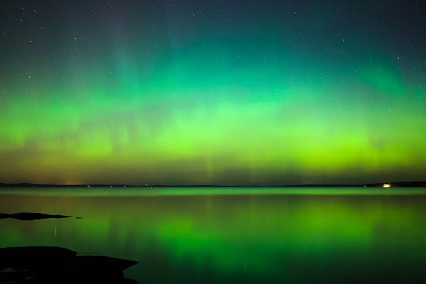 istock Northern lights over lake in finland 518618478