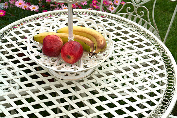 istock Iron garden table and chair 518618784