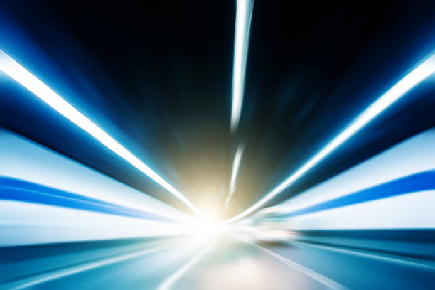 istock Speed motion in highway tunnel 518621578