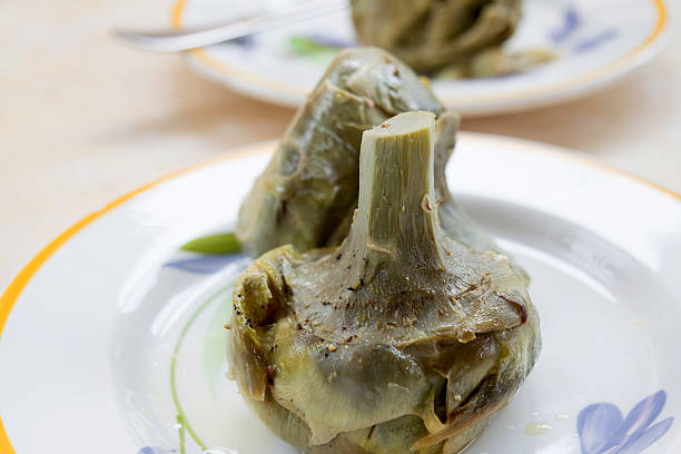 istock steamed whole artichokes 518621854