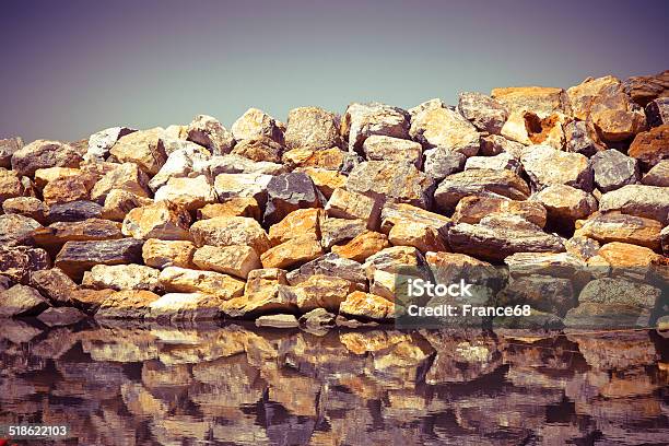 Rock Wall Protection From The Waves Stock Photo - Download Image Now - At The Edge Of, Border - Frame, Boulder - Rock