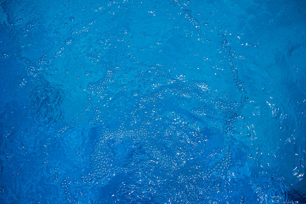 istock Pool blue with the reflection of sunlight 518622798