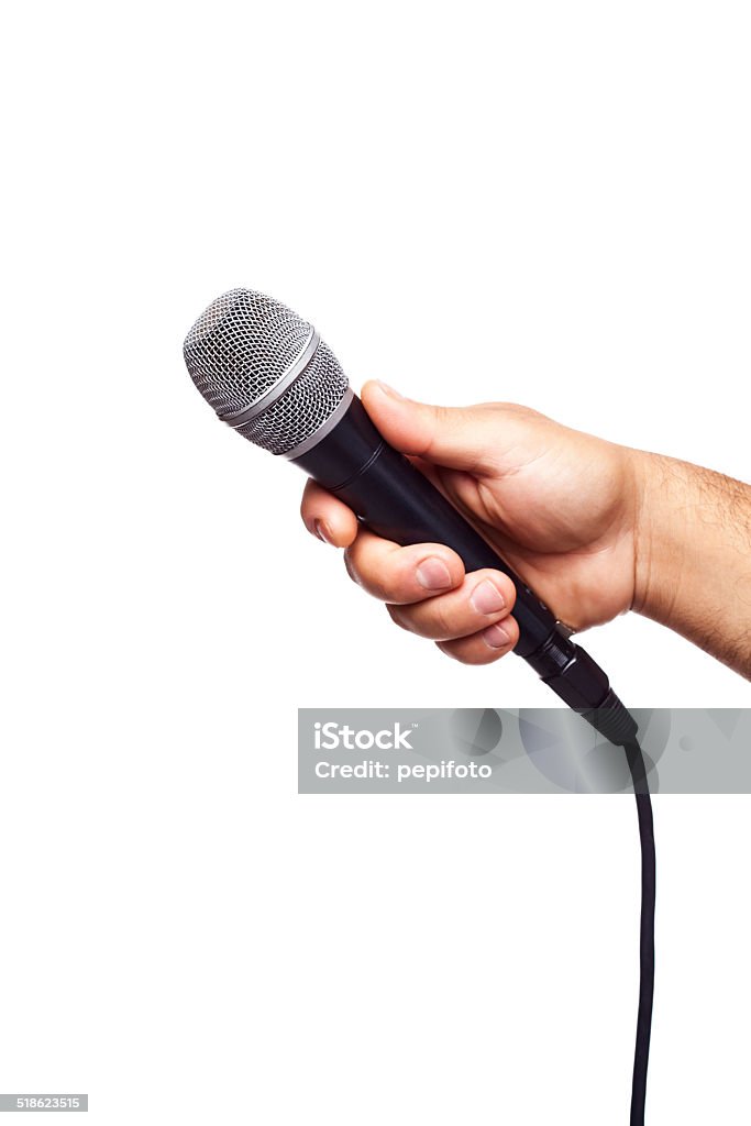hand hält ein Mikrofon - Lizenzfrei Ankündigung Stock-Foto