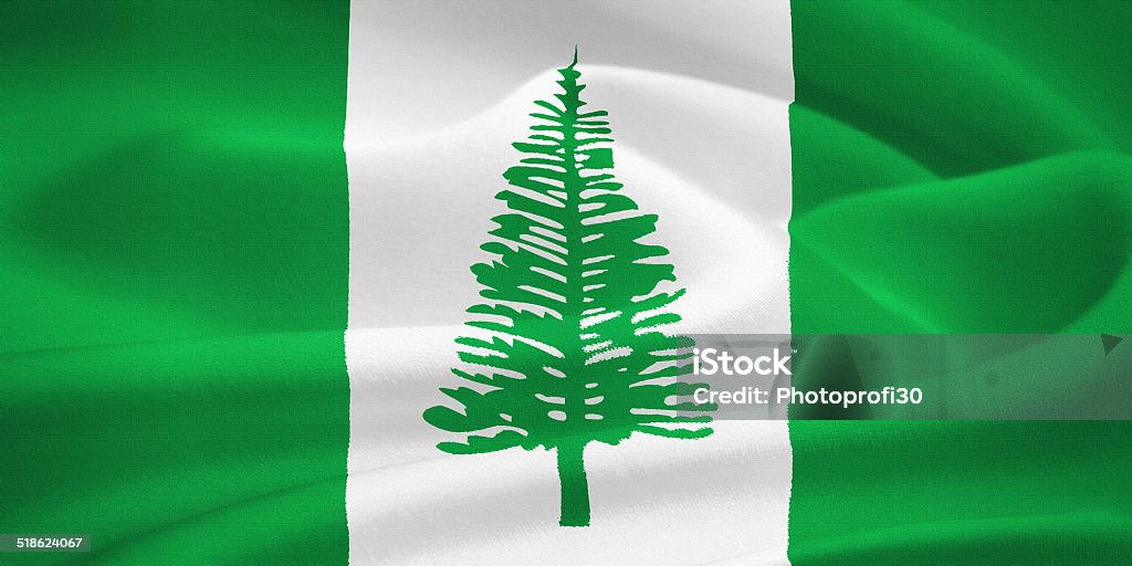 Flag of the Norfolk Island Flag of the Norfolk Island waving in the wind. Silk texture pattern Australia Stock Photo