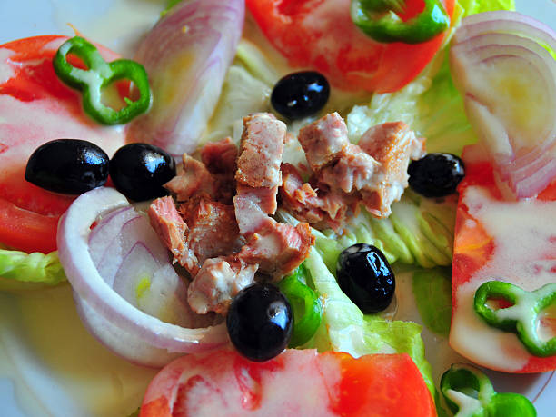 tuna salad Béjaïa / Bougie, Kabylia, Algeria: tuna salad with olives - Mediterranean cuisine  kabylie stock pictures, royalty-free photos & images