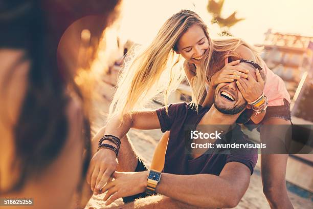 Girl Surprises Guy Stock Photo - Download Image Now - Hands Covering Eyes, Surprise, Summer
