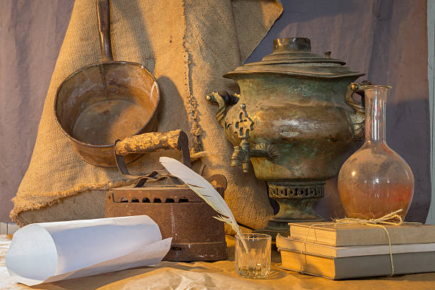 istock still life of antiques: a samovar, iron, feather 518626742