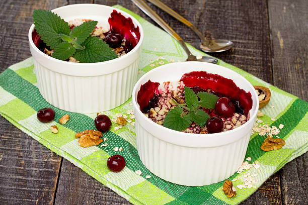 istock Homemade cherry crumble dessert in a rustic style. 518628068