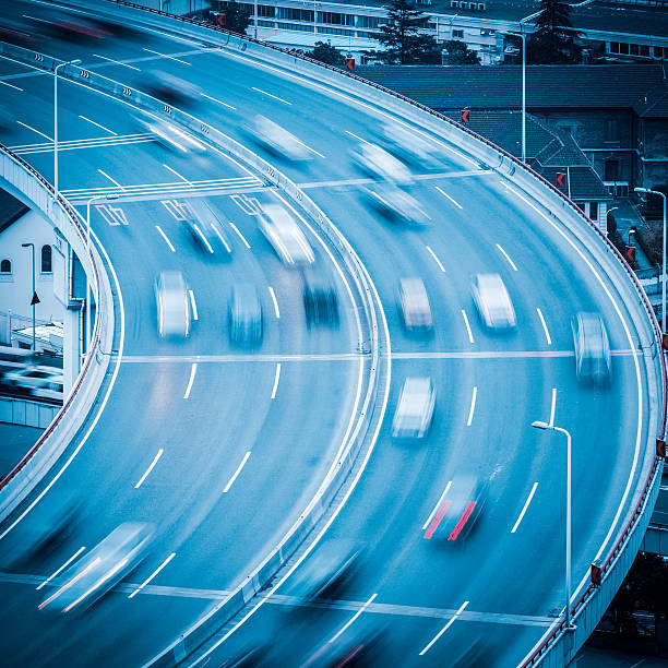 istock car motion blur on the approach bridge 518639935
