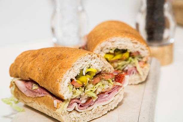 Cut Italian Sub on Wood Cutting Board