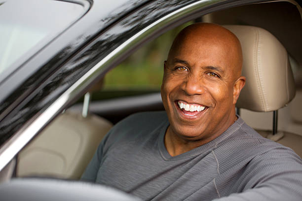istock African American man in a car 518640121