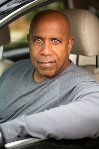 istock African American man in a car 518640129