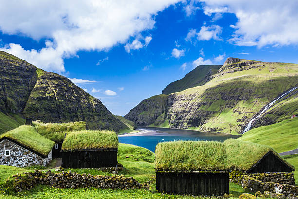 Village of Saksun, Faroe Islands, Denmark Village of Saksun located on the island of Streymoy, Faroe Islands, Denmark. sod roof stock pictures, royalty-free photos & images