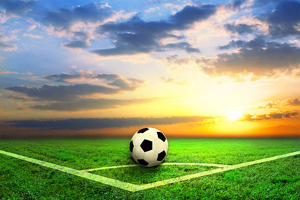 istock black and white soccer ball on the field 518649838