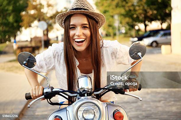 Portrait Of A Beautiful Girl Sitting On Silver Retro Scooter Stock Photo - Download Image Now