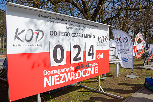 Warsaw, Poland - April 2nd, 2016: Counter of the  Committee for the Defence of Democracy (KOD) setting up opposite the teat of the Polish government. This is the KOD protest agaist Polish Prime Minister. Beata Szydło doesn't want to publish a judgment of the Constitutional Court. 24th day of the protest.