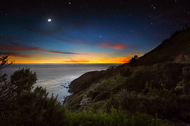 Fog bank above the ocean water off the California Coast stock photo