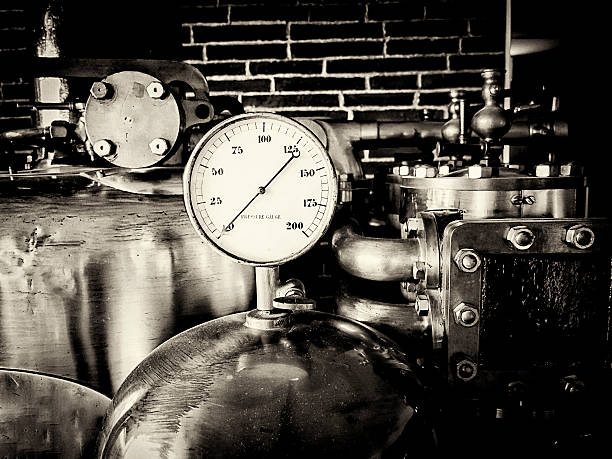 istock Pressure gauge and cylinders, black and white 518655984