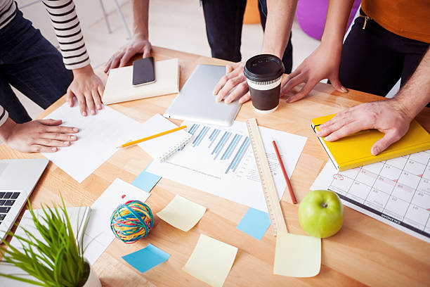 istock Skillful young freelancers are discussing new project 518657716