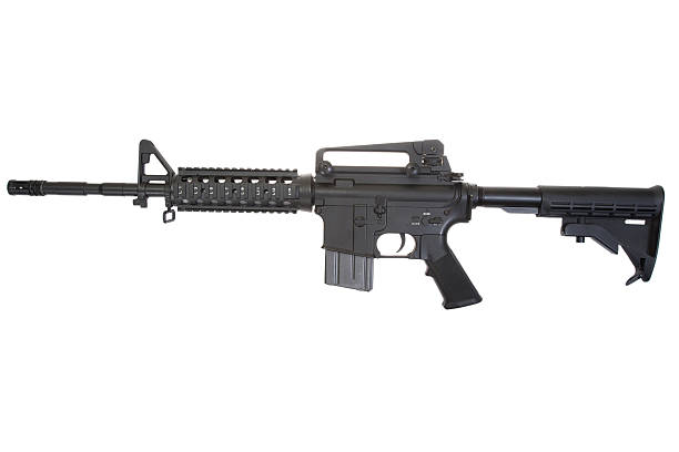 istock Colt M4A1 isolated on a white background 518658075