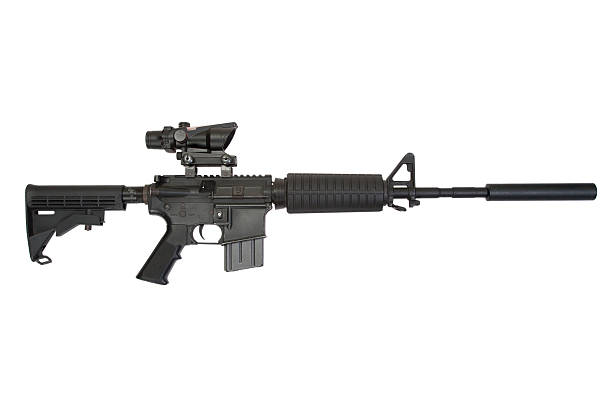 istock firearms with silencer isolated on a white background 518658115