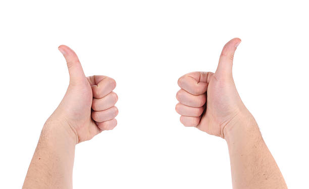 istock Two male hands with thumbs up. 518658203