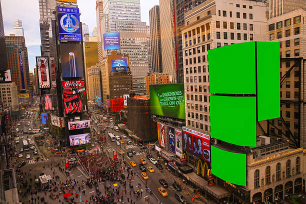 Big Green screen Chroma key in Time square NYC Big Green screen in Time square, Manhattan NYC times square stock pictures, royalty-free photos & images