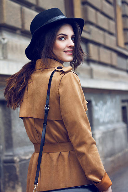 istock Beautiful woman in coat 518658746