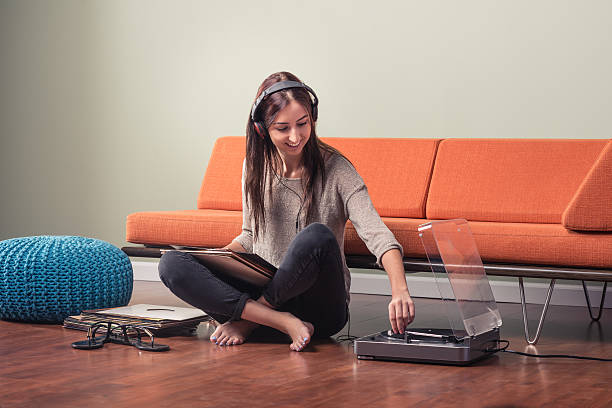 istock Young Woman Playing A Record 518659033