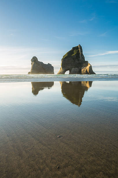 istock Rocky Islands at Wharariki Beach 518659184