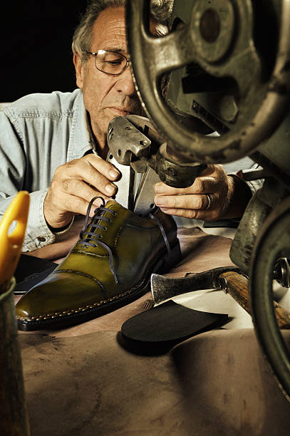 istock craftsman making luxury handmade man shoes 518659466