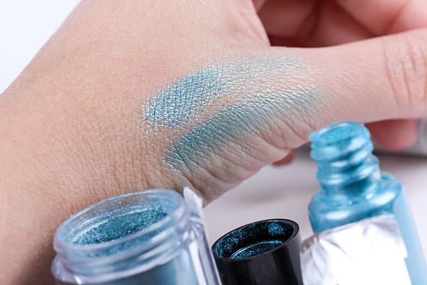 istock Trying professional eye shadows on hand 518659512
