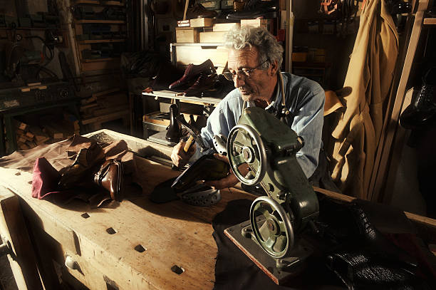 istock craftsman making luxury handmade man shoes 518660082