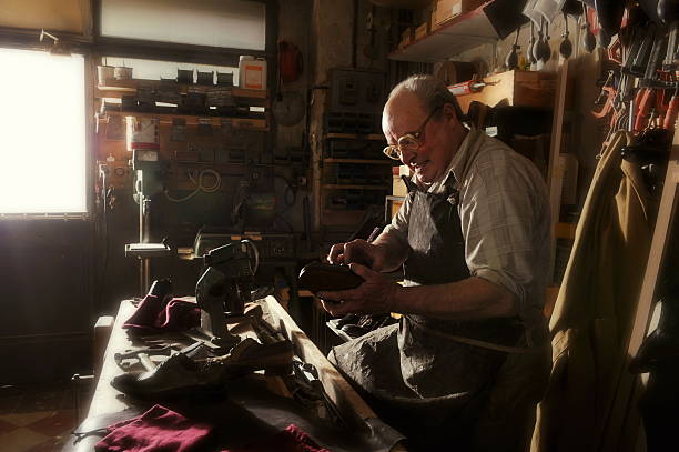 istock craftsman making luxury handmade man shoes 518660728