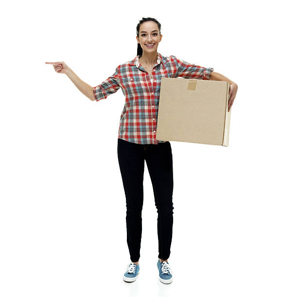 istock Woman carrying cardboard 518662488