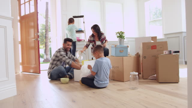 Hispanic Family Moving Into New Home Shot On R3D