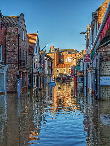 The Flooded Streets Of York York, UK - December 27, 2015. The flooded streets of the city of York after the River Ouse burst its banks because of prolonged, heavy rainfall. ouse river photos stock pictures, royalty-free photos & images