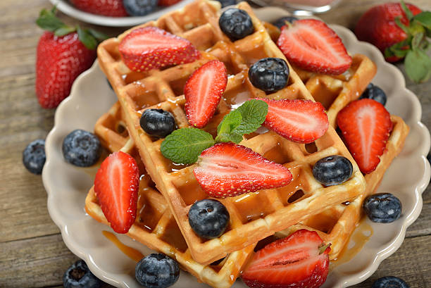 istock Waffles with berries and caramel sauce 518674614